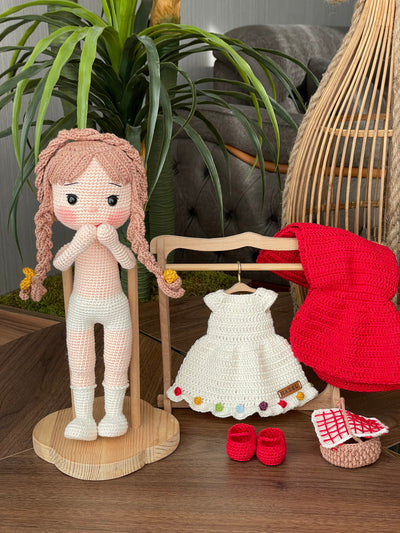 Handmade crochet Little Red Riding Hood doll, inspired by the classic fairytale, featuring a red cape, basket, and customizable name on a leather label. Perfect for kids and collectors.