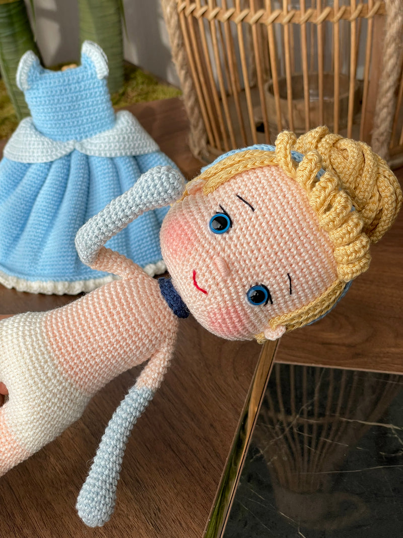 Handmade Cinderella Doll, crocheted using amigurumi technique with a blue dress, blonde hair, and custom name on a leather label, perfect for princess lovers and gifts.