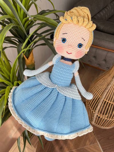 Handmade Cinderella Doll, crocheted using amigurumi technique with a blue dress, blonde hair, and custom name on a leather label, perfect for princess lovers and gifts.