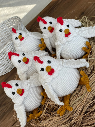 Handmade crocheted Chicken Toys with a cute and detailed design, featuring a red comb and yellow feet. This amigurumi toy is customizable with a name on a leather label, making it a perfect farm-themed nursery decor and personalized gift.