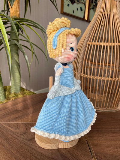 Handmade Cinderella Doll, crocheted using amigurumi technique with a blue dress, blonde hair, and custom name on a leather label, perfect for princess lovers and gifts.