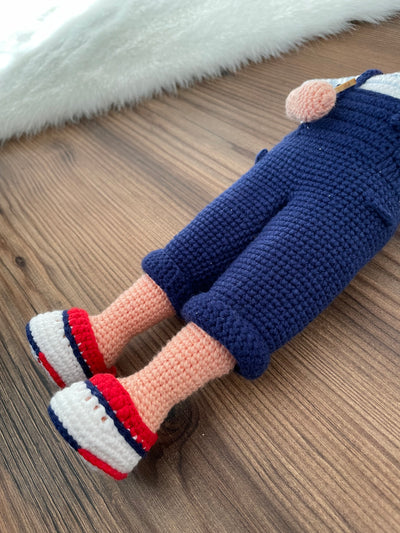 Handmade crocheted overall boy doll, crafted with amigurumi technique using 100% cotton yarn, customized with a name on a leather label, perfect gift.