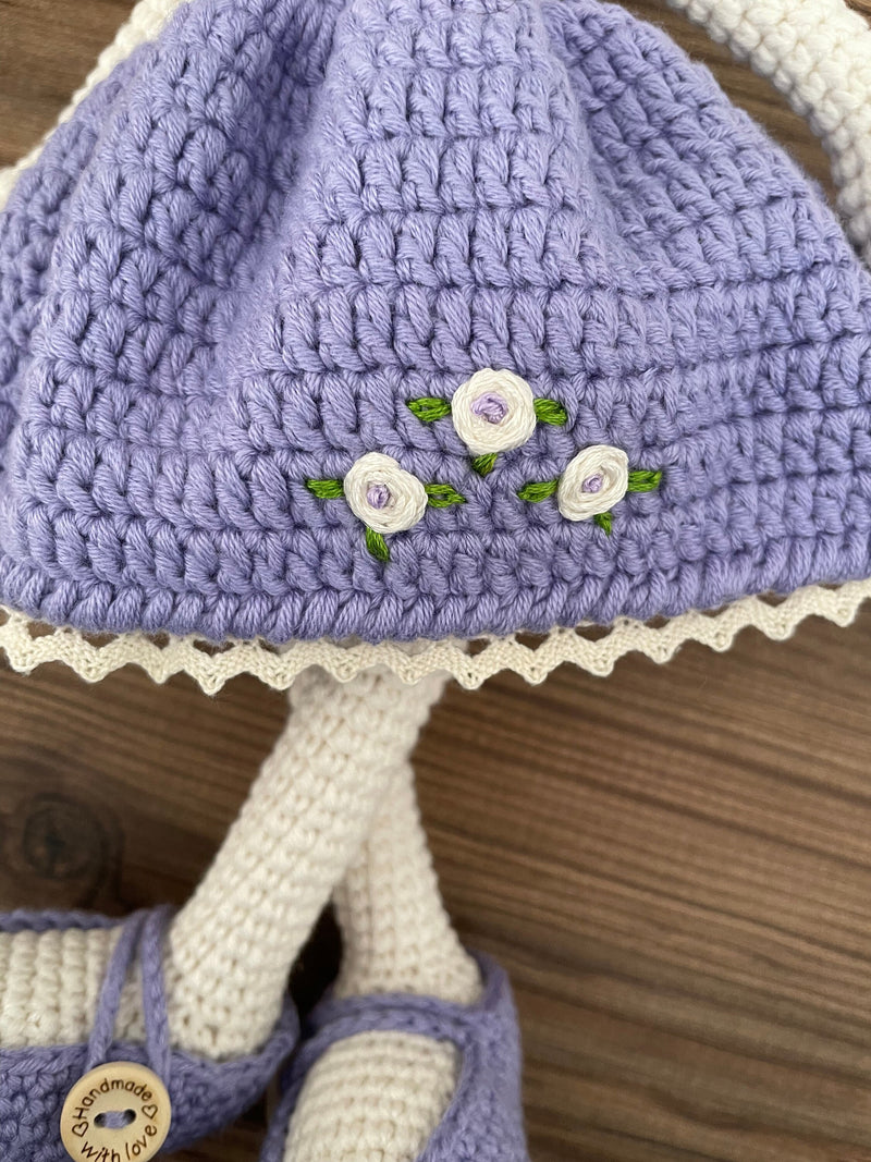 Handmade crochet Lilac Dressed Bunny Rabbit Toy, featuring long ears, a lilac dress with floral details, and personalized with a name on a leather label. Perfect for gifting.