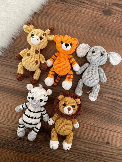 Handmade Safari Animals set including giraffe, tiger, elephant, zebra, and lion, all made with 100% cotton yarn, perfect for unique toddler gifts and imaginative play.